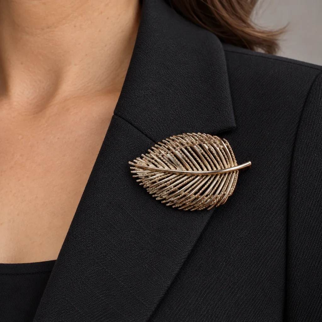 AI styling preview of Lisner Leaf Brooch worn on a model