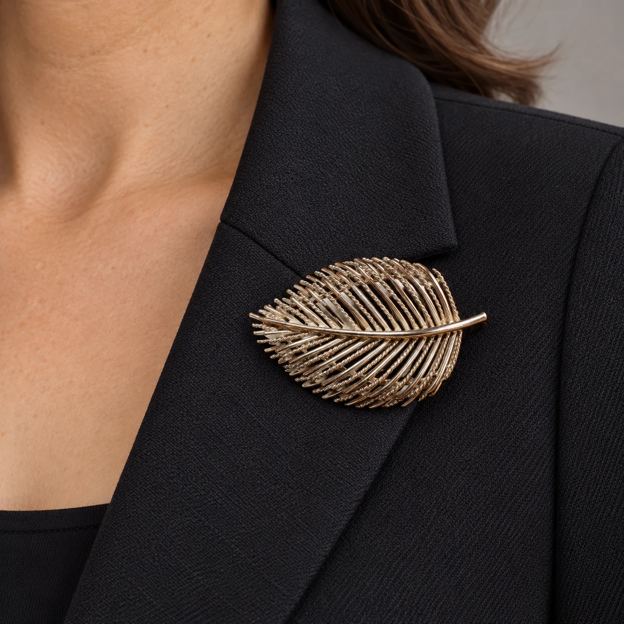 AI styling preview of Lisner Leaf Brooch worn on a model