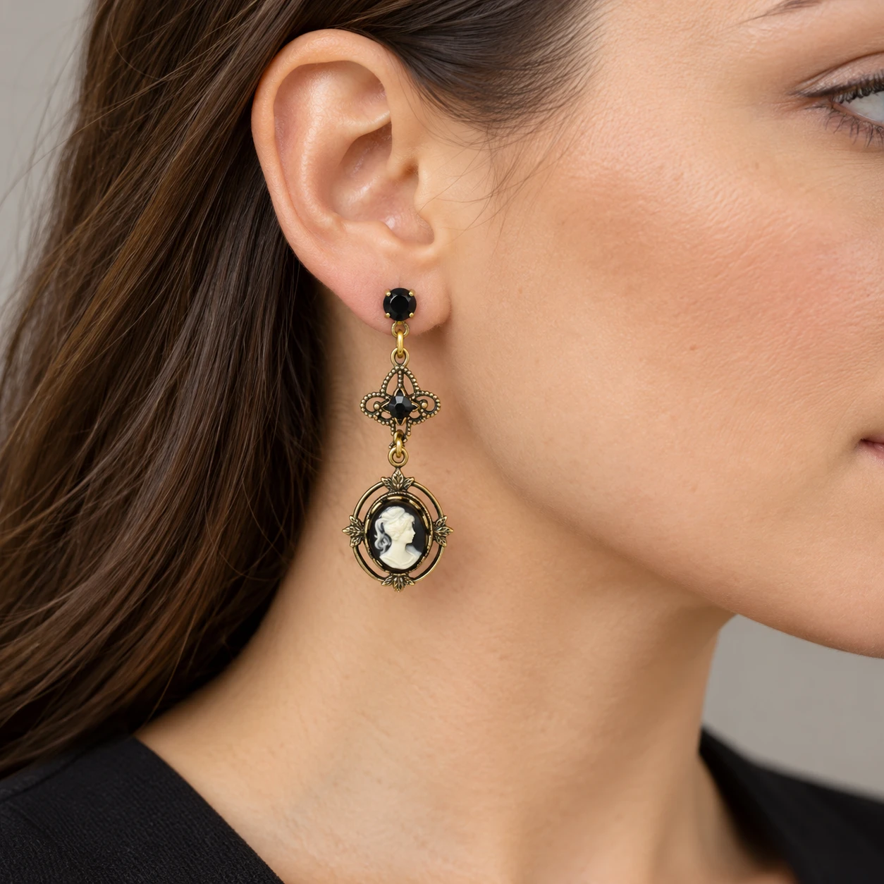 AI styling preview of Black Cameo Filigree Drop Earrings worn on a model