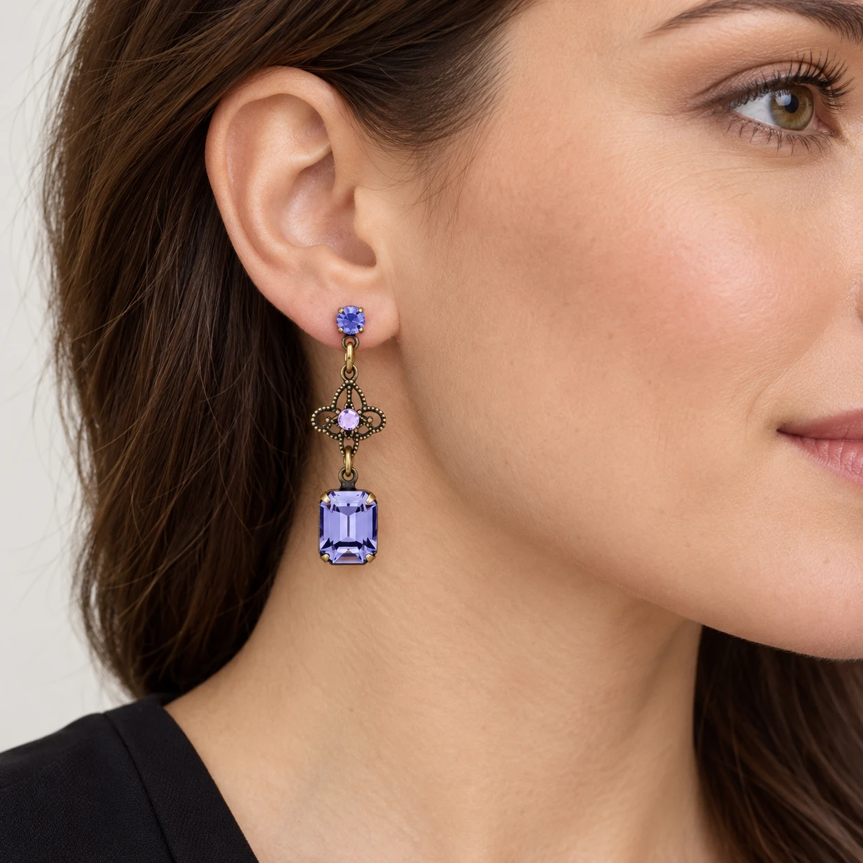 AI styling preview of Tanzanite-Tone Octagon Filigree Earrings worn on a model