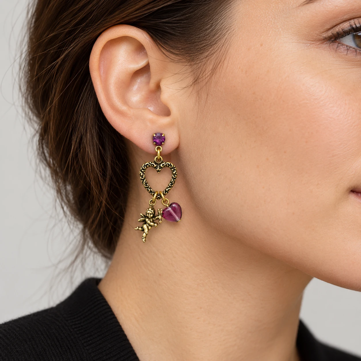 AI styling preview of Cherub & Glass Heart Drop Earrings worn on a model