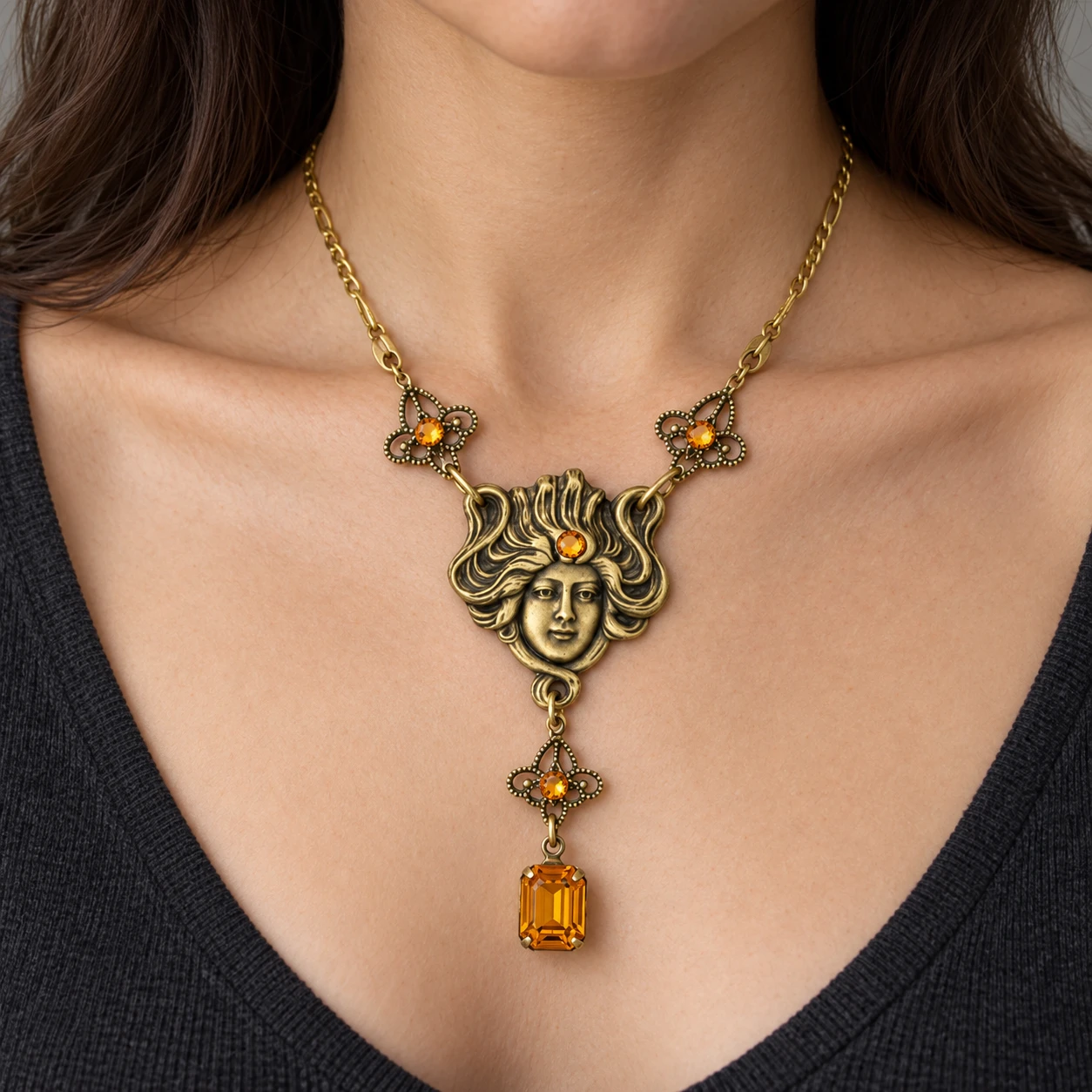 AI styling preview of Topaz-Tone Filigree Drop Necklace worn on a model