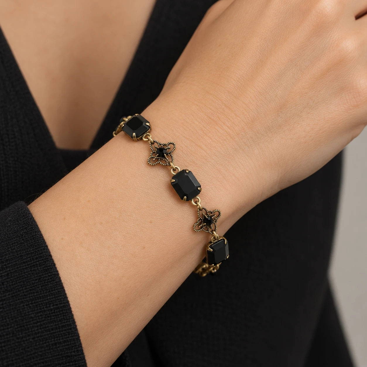 AI styling preview of Black Crystal Filigree Bracelet worn on a model