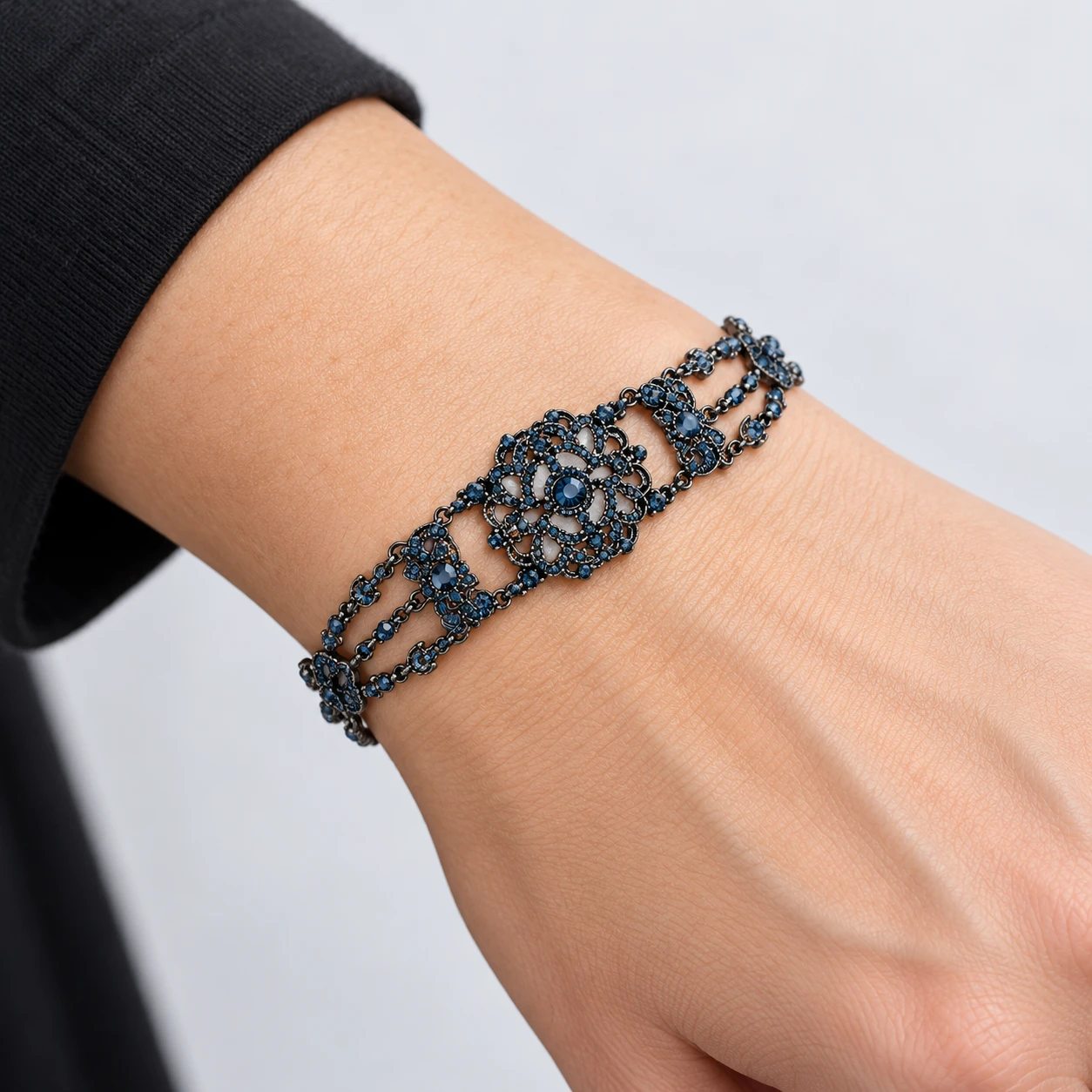 AI styling preview of Montana Blue Crystal Filigree Bracelet worn on a model